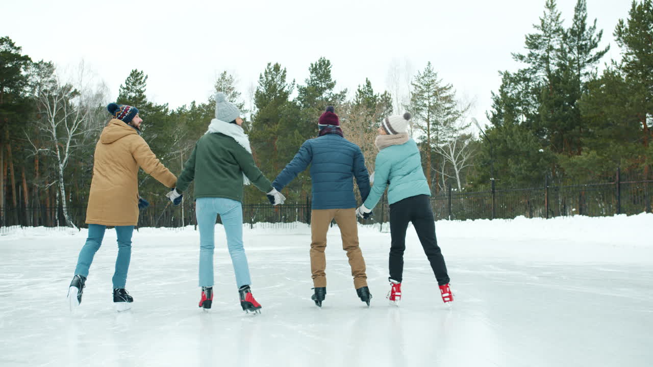 Friends Ice Skating in Winter Park
