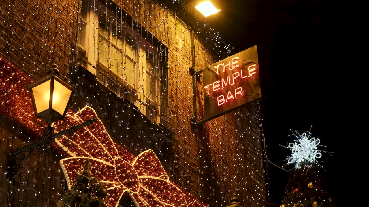 Christmas lights and red facade of the Temple Bar in Dublin