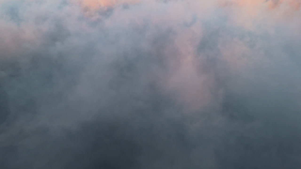 Aerial view of sunrise clouds creating a serene and peaceful atmosphere