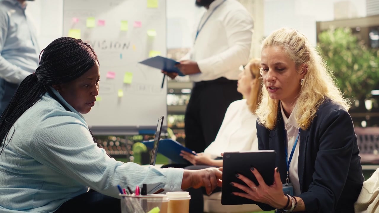 Diverse Business Team Collaborating in Modern Office Meeting