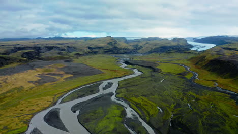 icelandic river valley with glacier view