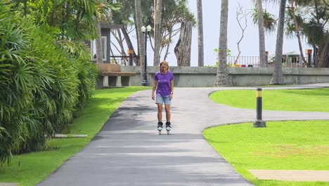 woman roller skating in a park