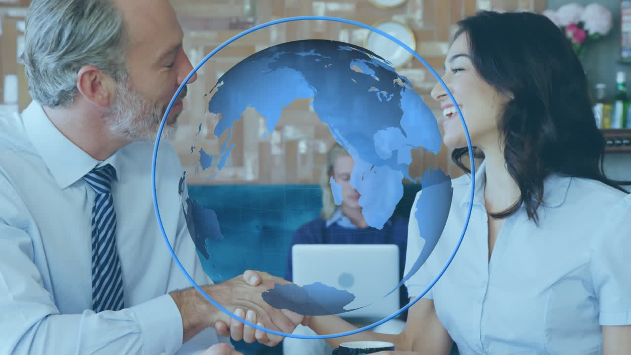 비즈니스 사람들이 손을 흔들고 지구가 회전하고 있습니다.