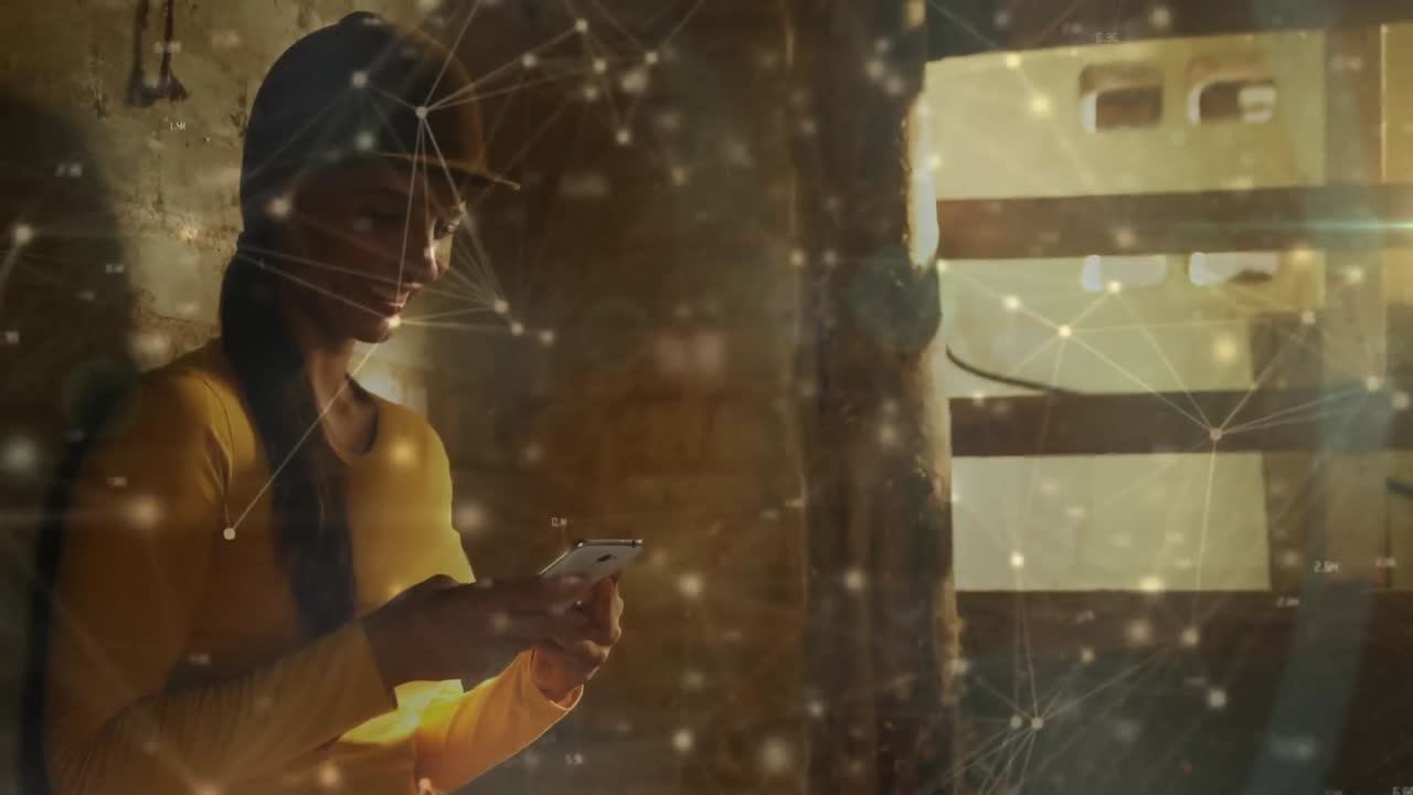 Animation of network of digital icons over woman using smartphone