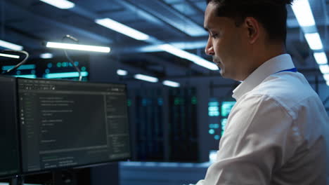 computer scientist overseeing data center, making improvements