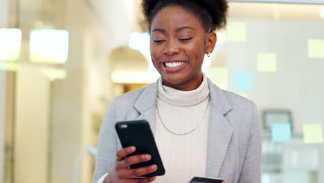 financial trader on phone typing credit card