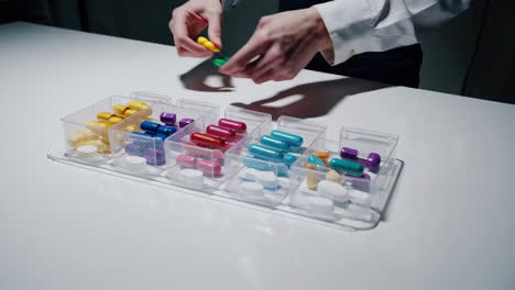 organizing medication into pill containers