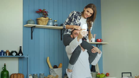 couple taking selfie on shoulder