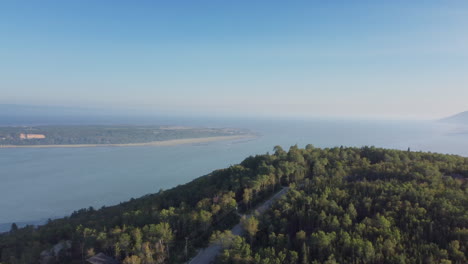 Pan-view-over-Baie-St-Paul-region,-Charlevoix,-Quebec,-1-hour-before-sunset