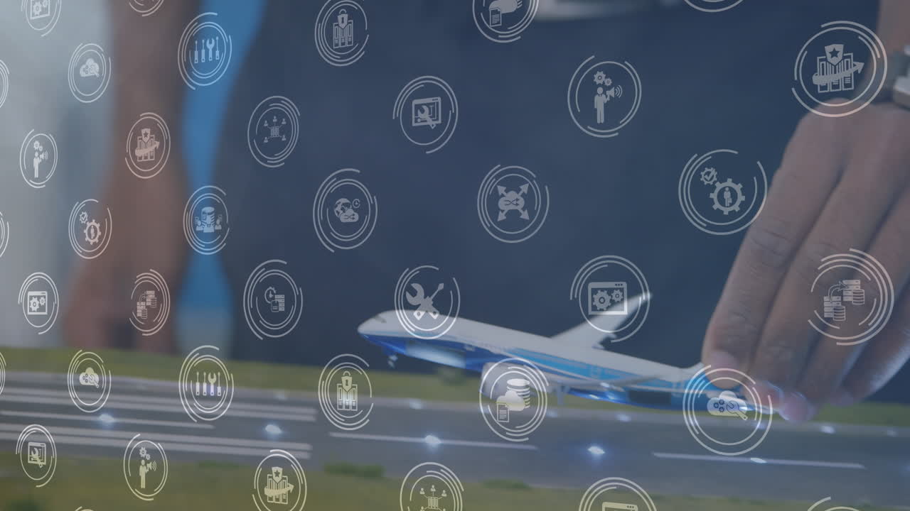 animación de iconos digitales sobre la sección media de una mujer volando un modelo de avión en la oficina.