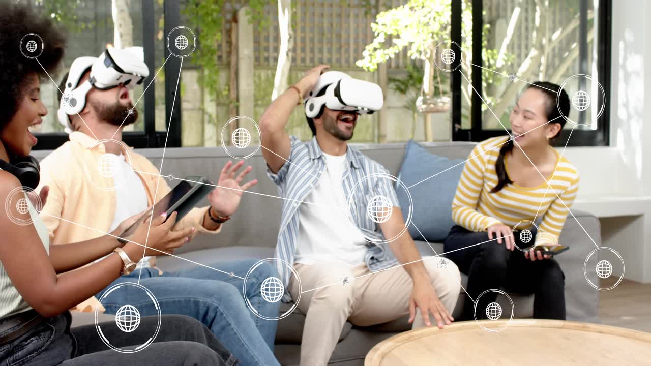 Woman tapping tablet, friends donning VR headsets gesturing at globe icons for tech demo