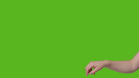 Close-Up-Of-Child-Making-Online-Scrolling-Gesture-Against-Green-Screen-1