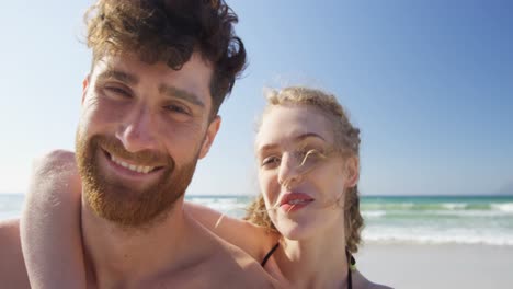romantic couple smiling at the beach 4k