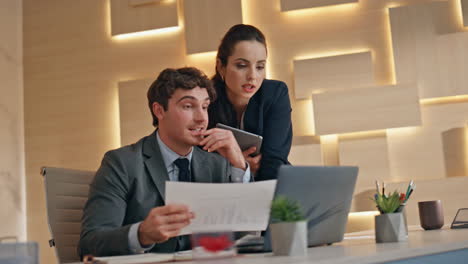 office team reading contract working at computer closeup. managers discussing