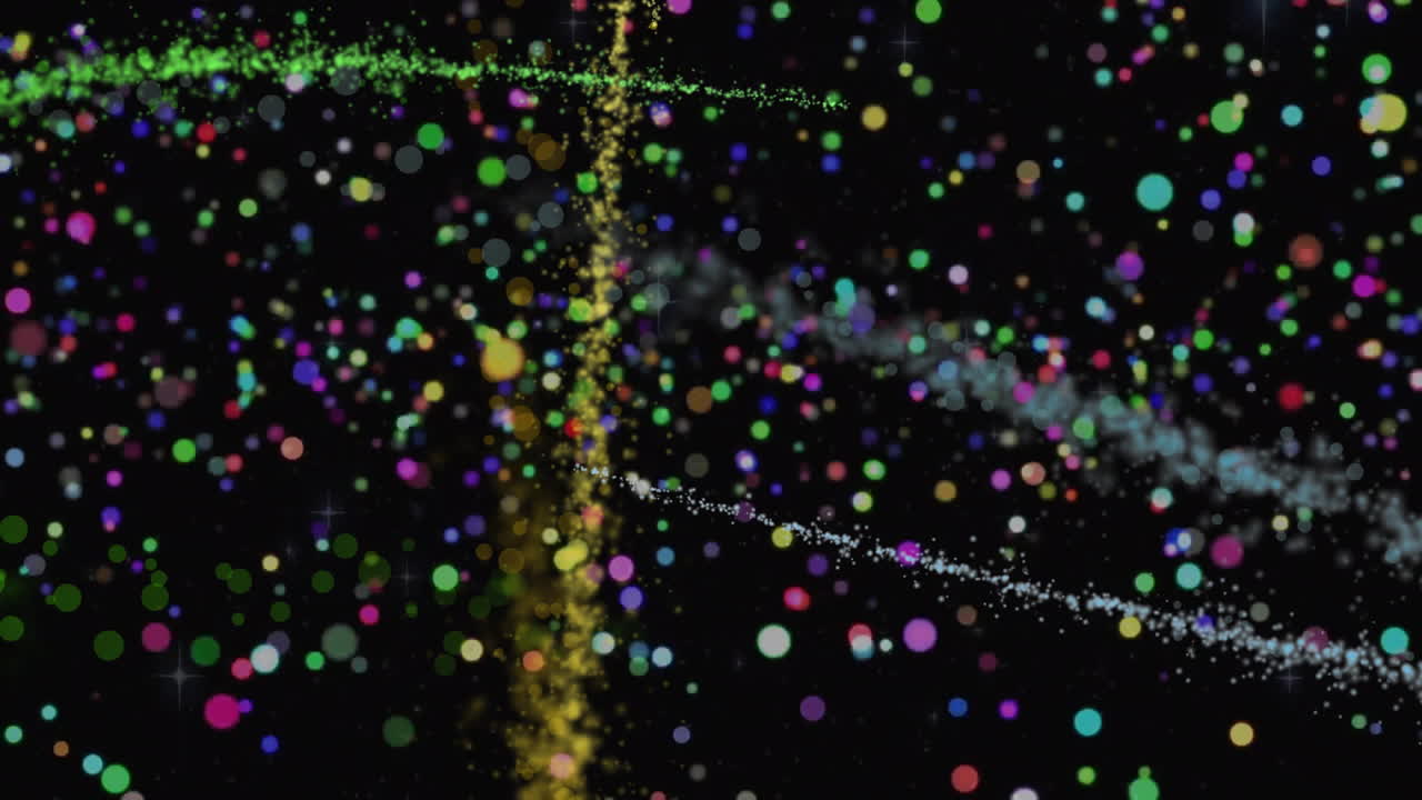 검은 바탕에 있는 다채로운 빛의 흔적과 반점들의 애니메이션