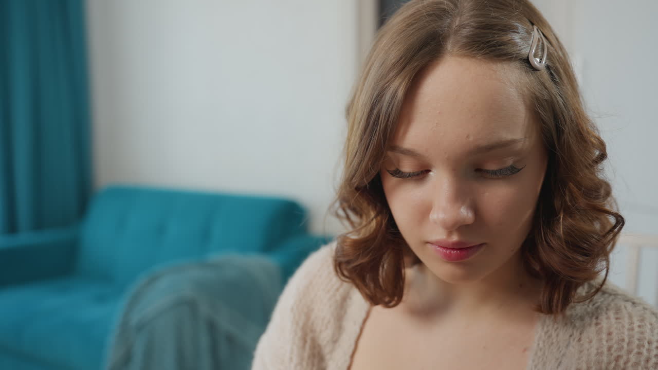 Calm Woman Carefully Applying Eyeliner, Serene Woman Concentrating On Precise Eyeliner In Mirror, Detailed Shot Of Woman Meticulously Applying Eyeliner With Focus And Calmness In Mirror