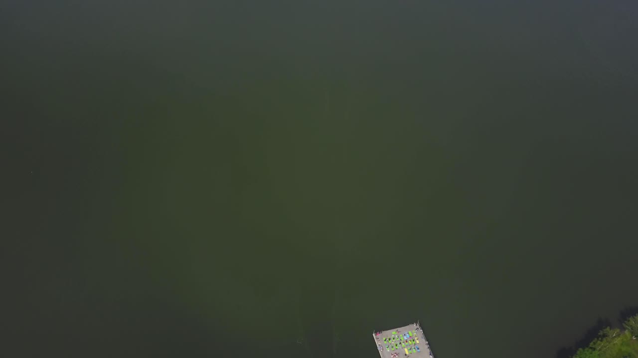 Aerial View of Lake Pier with People