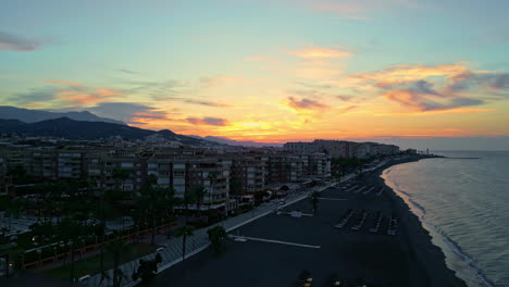 aerial view of coastal town of torrox at dusk in costa del sol, malaga, spain