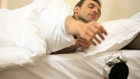 man putting eye mask to himself