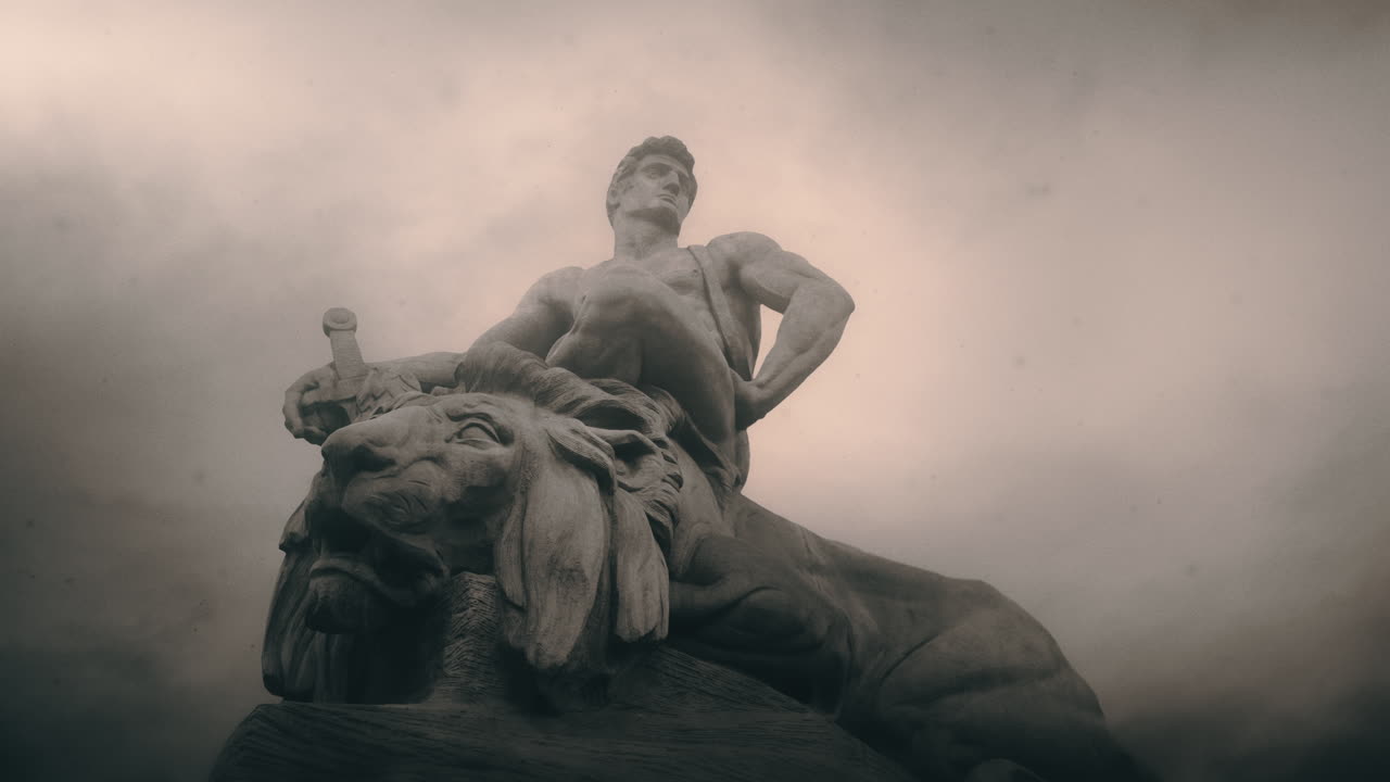 Epic, ancient stone statue on cloudy day and windy weather.