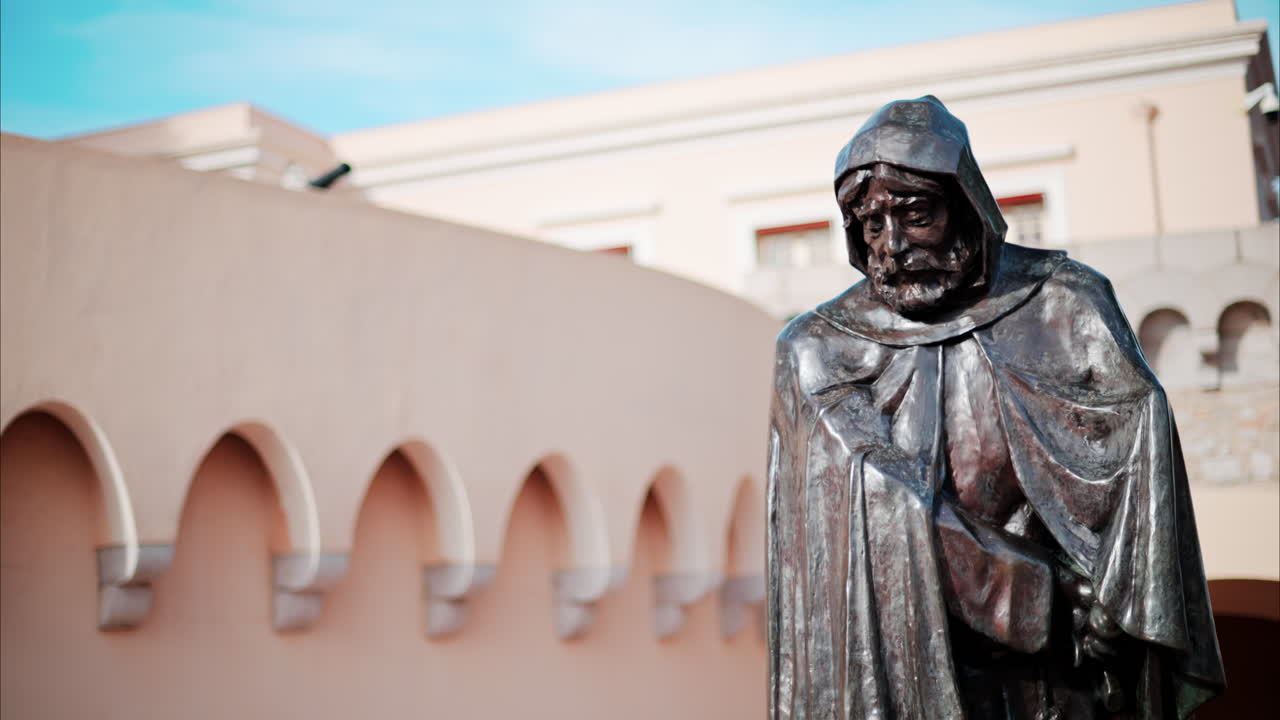 Monaco City, Monaco - October 4, 2024: Statue of Prince Francois Grimaldi with the Palace at background
