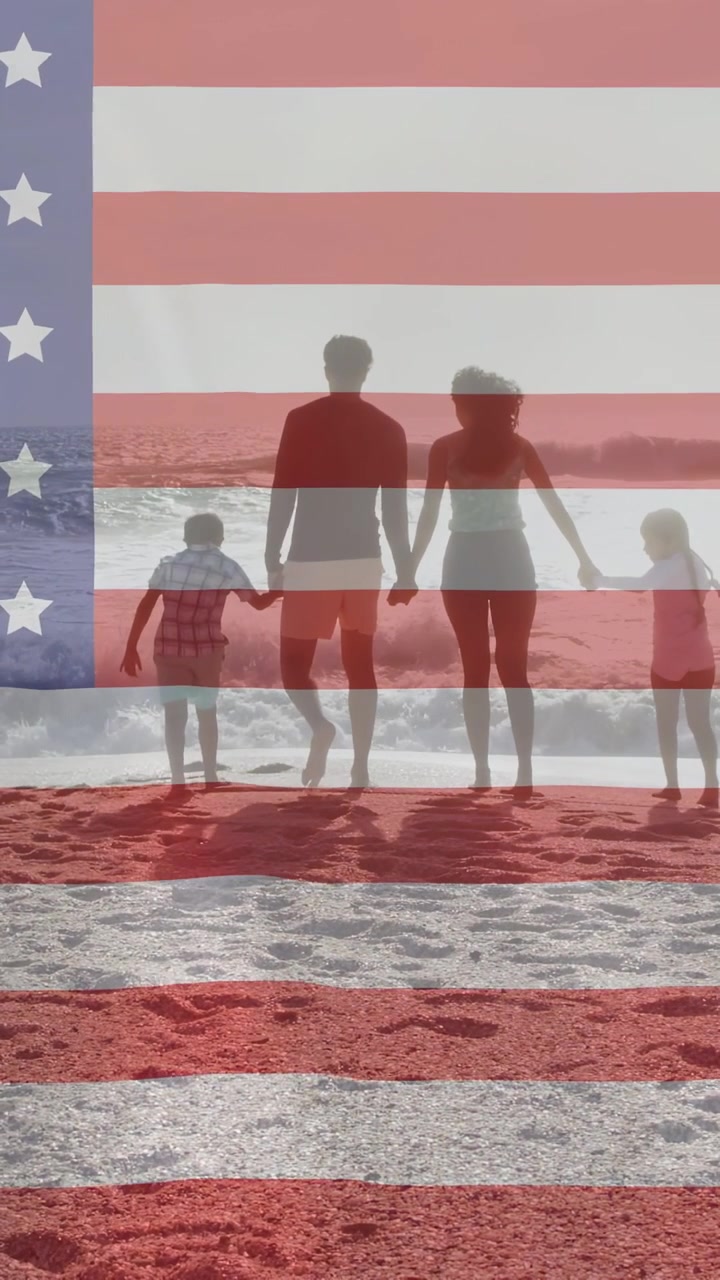 Vertical video: Family starting toward sea, parents holding, kids skipping, US flag overlay for ad