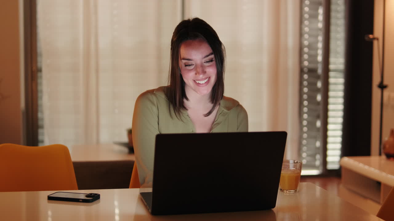 Portrait of Happy Woman on a Video Call at Home
