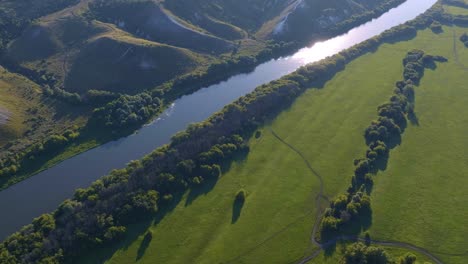 aerial view of a river and lush green valley