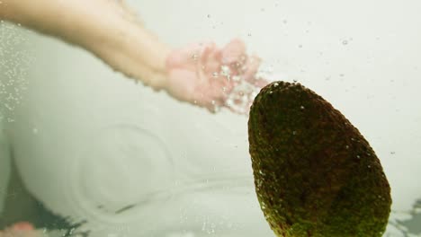 avocado splash underwater
