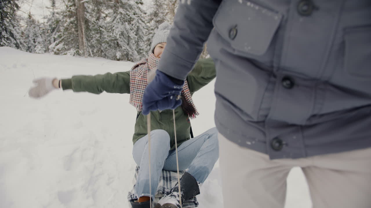 Winter Fun Sledding in the Woods