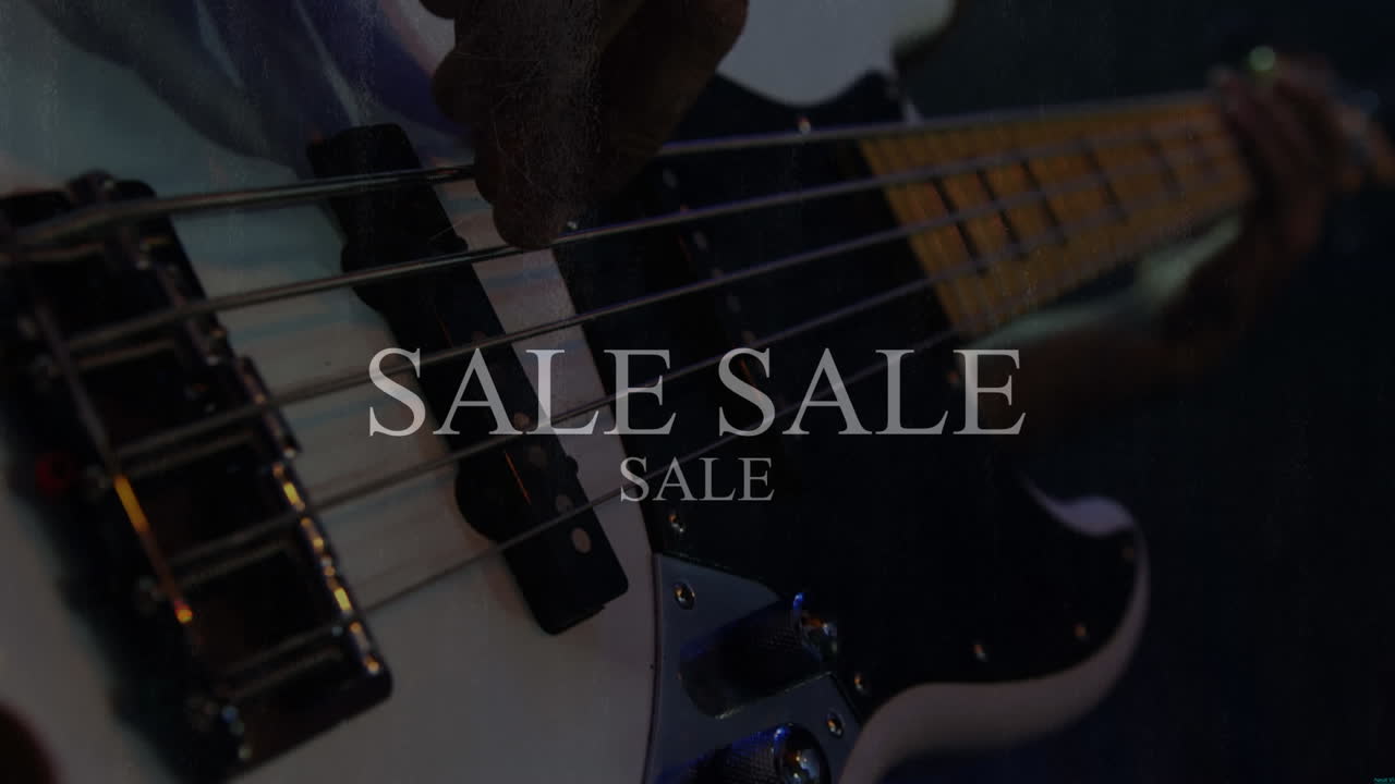 Gitar çalan kişi üzerinde indirim yazısı animasyonu
