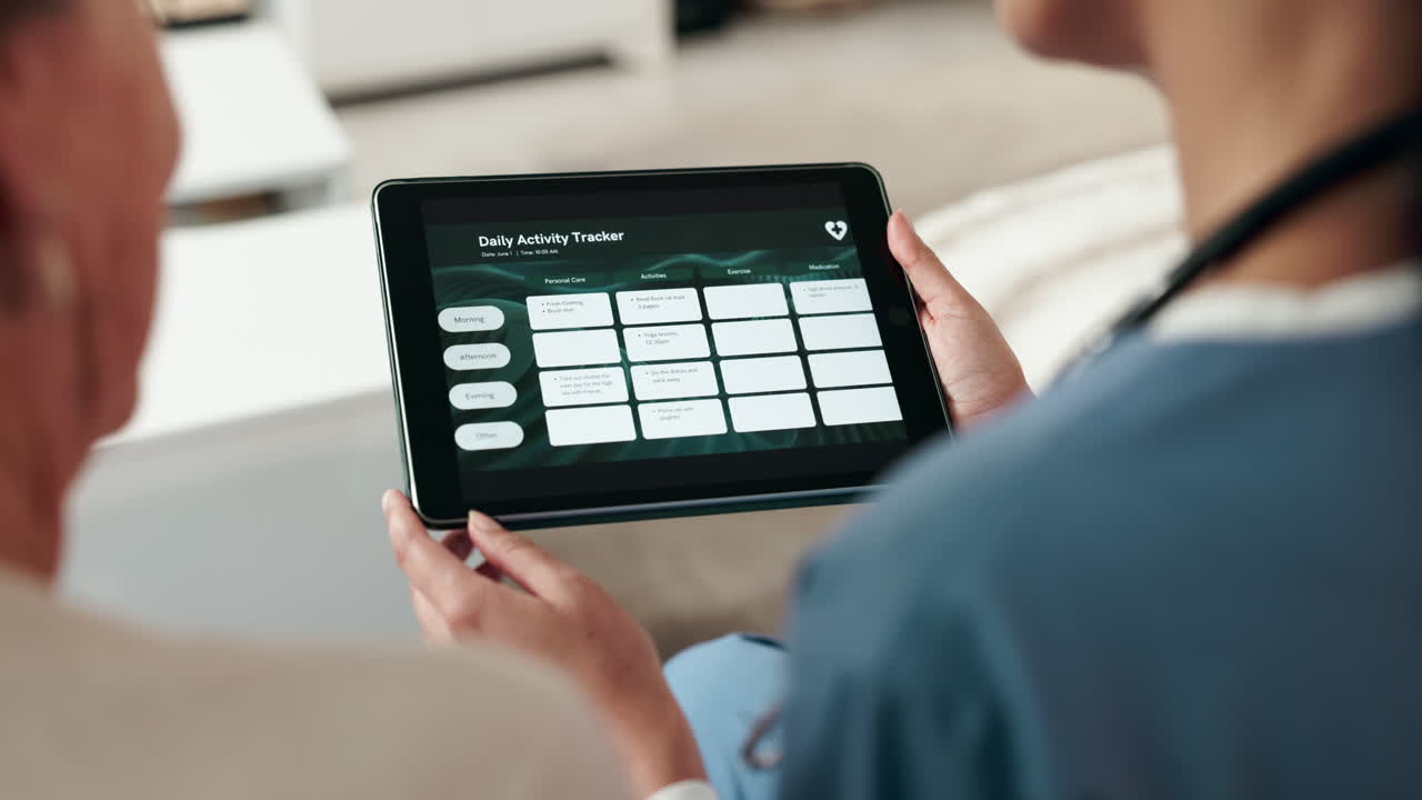 Doctor showing daily activity tracker on a tablet