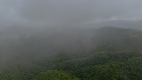 The-drone's-journey-through-the-clouds-unveils-the-stunning-mountain-scenery-of-a-tropical-paradise