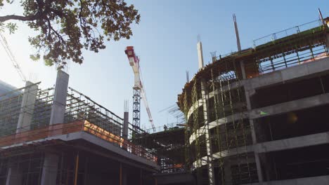 Crane and building construction site
