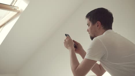 a young and modern man is engaged online to improve his skills at work