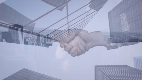 digital composition of business people shaking hands against tall buildings in background