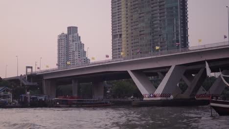 bangkok river bridge at sunset