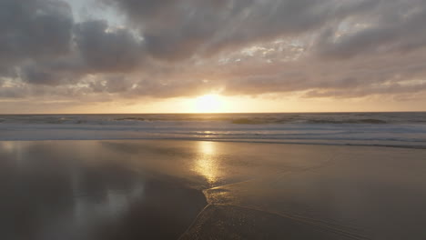 sunset at the beach: serene ocean waves and golden sky