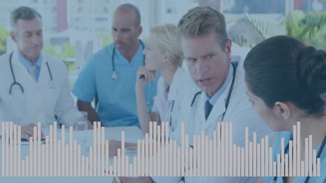 discussing patient care, medical professionals viewing audio waveform animation