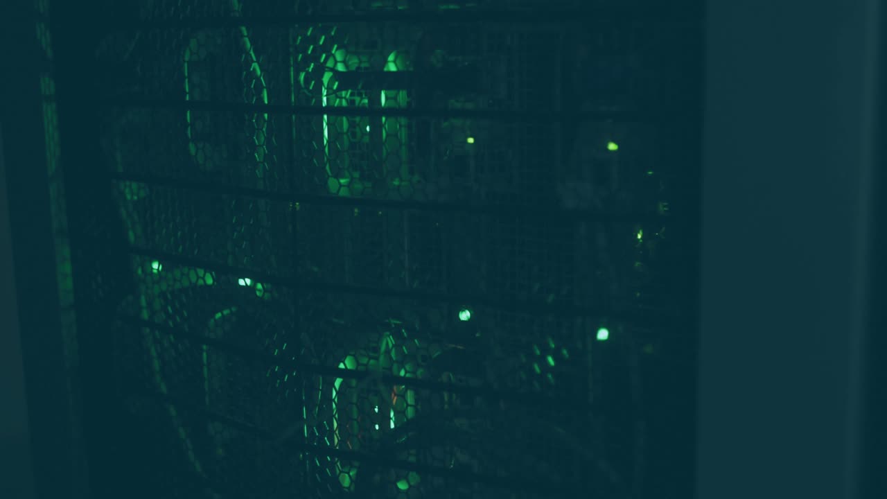 Data feed starting, blue charts appearing and expanding over server racks, showing network status