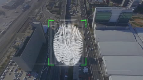 animation of biometric fingerprint scanner over aerial cityscape and road