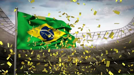 Golden-confetti-falling-over-waving-brazil-flag-against-sports-stadium-in-background