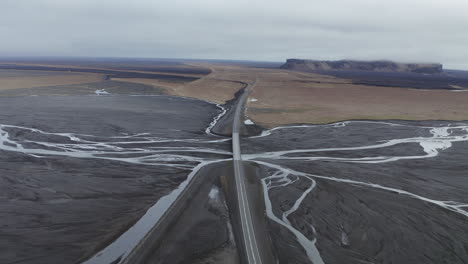 aerial orbiting view isolated bridge over icelandic river