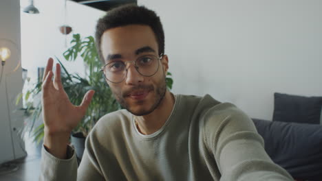 male blogger making video at home