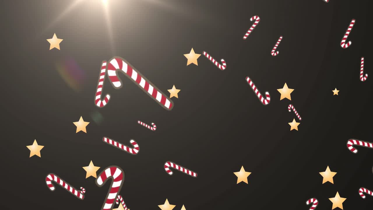 검은 바탕에 떨어지는 크리스마스 별과 사탕의 애니메이션