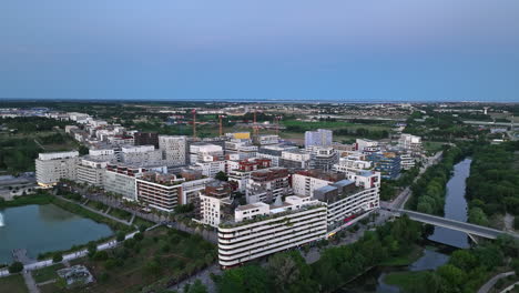 Aerial-sweep-of-Port-Marianne,-Montpellier's-showcase-of-urban-modernism-and-des