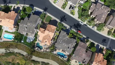 aerial drone flyover looking down at luxury homes in laguna niguel, orange county, california