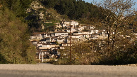 Road-leading-up-to-Travel-destination-Berat,-Albania,-Low-angle,-Wide-shot