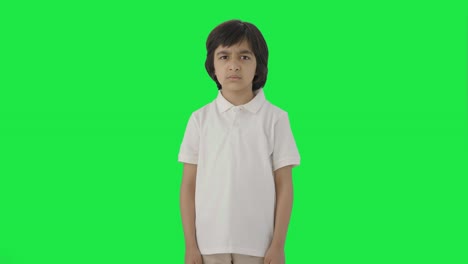 Angry-Indian-boy-looking-at-the-camera-Green-screen