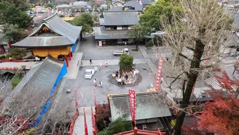 aerial view over the temple area with preparations for the famous fire festival at yutoku inari shrine in kyushu, japan